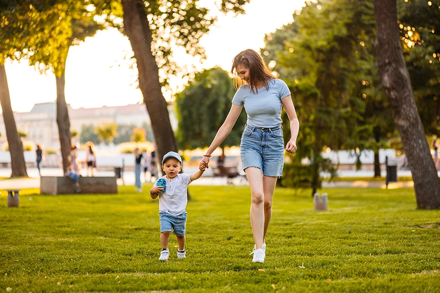 Mother and child enjoying a sunny day at a beautiful park in Anketell, part of the vibrant Catena Estate community designed for families to thrive